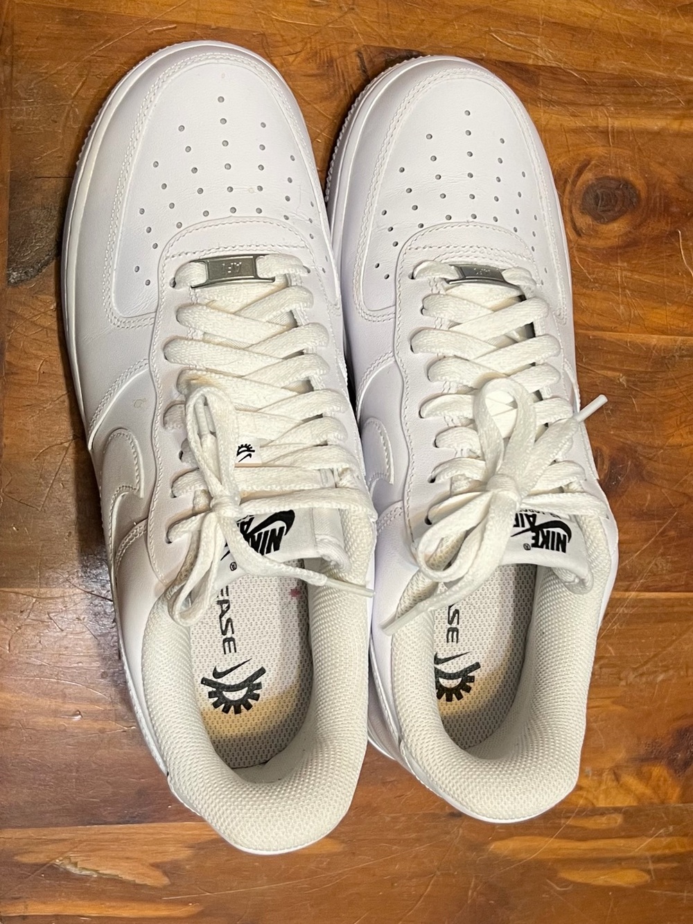 Nike Women’s White Low-Top Leather Sneakers with Perforated Toe
